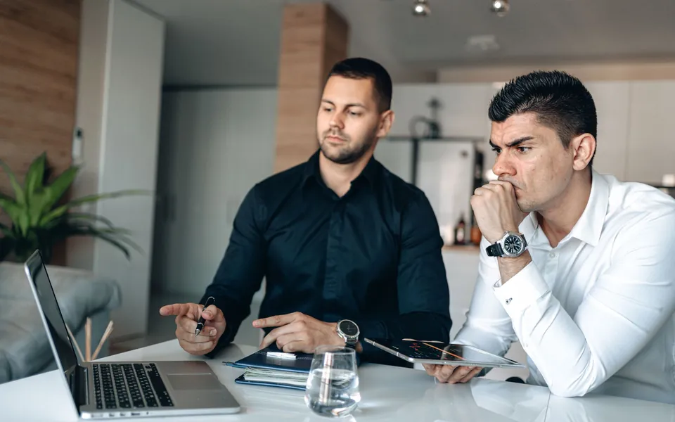 IT consulting: consultants reviewing a company's operations